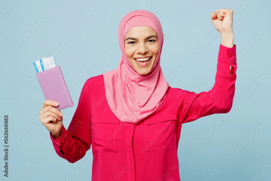 Do Emirati women wear abayas when they travel abroad?